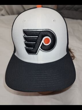 Philadelphia Flyers Snapback Hat Featuring A Raised Embroidered Team Logo